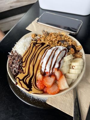 Snickers dragon bowl March special with coconut yoghurt and gf granola  at Claire's Wholesome Kitchen in Springfield Central