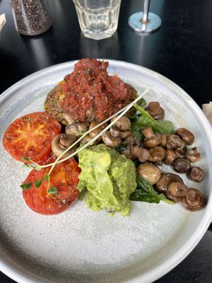 Quinoa fritters with mushrooms, avo & tomato  at Claire's Wholesome Kitchen in Springfield Central