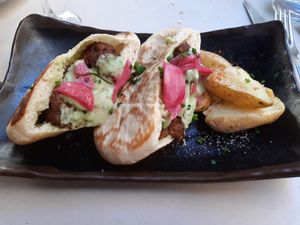 Main / Aubergine meatball pita bread sandwich at La China Mandarina in Madrid