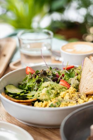 Scrambled tofu, vegetable, tempeh bacon, avocado cream at NEØ Coffee House in Barcelona