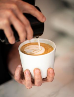 Oatmilk latte, specialty coffee by Animal Coffee Roaster at NEØ Coffee House in Barcelona