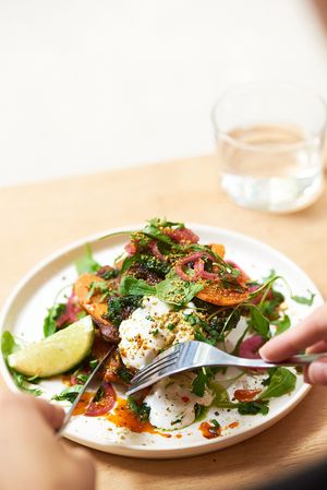Fritters with cream cheese, salsa verde, pickles at NEØ Coffee House in Barcelona