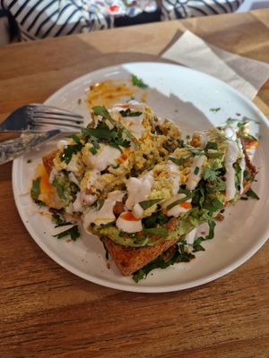 Loaded sourdough toast at NEØ Coffee House in Barcelona
