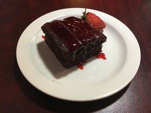 Chocolate cake with strawberry sauce  at Deja Vu in Memphis