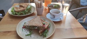 Fake tuna and avocado sandwich with citrus juice and acorn coffee at VeZa in Belgrade