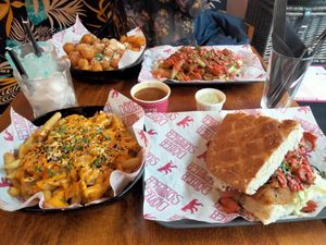 Garlic Parm'zan tots, Berlin Doner w/ flatbread, animal fries, gravy, pickle mayo dip, bad girl kebab w/ Turkish sandwich bread at Döner Summer in Leeds
