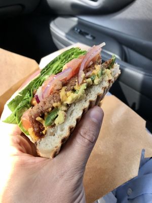 Cheddar Avo Jalapeño Burger (only 1/2 shown).  at Earthtone Natural Kitchen & Market in Glendora