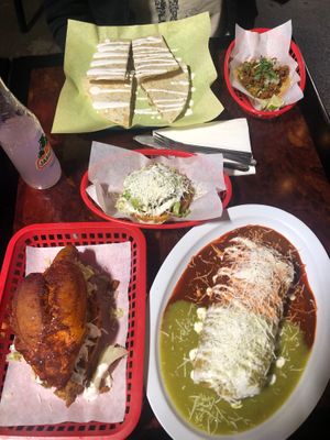 from L to R top to bottom: quesadilla, pastor taco, pastor sopes, the sandwich that is not the torta, deep fried chimichanga at SoyMexican in Las Vegas