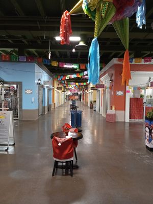 If you don't walk directly into the El Mercado food court from the parking garage, there might be a sign to guide you towards Comida at SoyMexican in Las Vegas