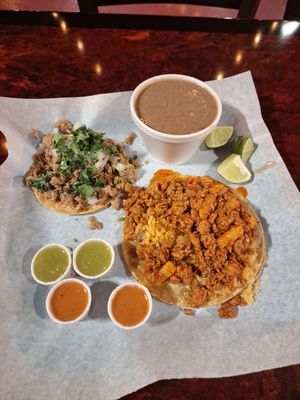 Vegan taco de guisado, taco asada e  side beans. at SoyMexican in Las Vegas