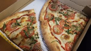 Vegan pizza by the slice at Pizza My Heart in Monterey