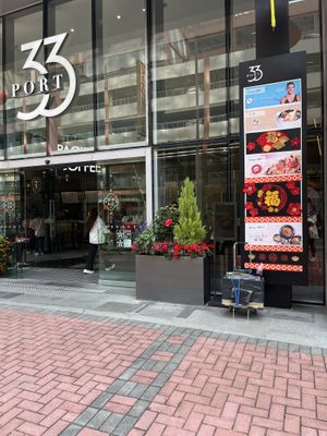 Entrance to the food mall. Go up the escalator   at Loving Hut 愛家 - Tseuk Luk in Kowloon