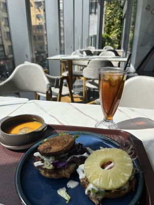 Carrot soup and pineapple burger and monk fruit drink   at Loving Hut 愛家 - Tseuk Luk in Kowloon