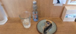 Black sesame flan and ramune lemonade. at Mori Cafe in Paris
