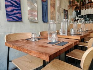 Seats inside at Mori Cafe in Paris