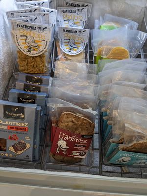 Deli case packaged meats at Planticeria in Panama City