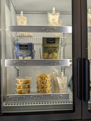 Deli case packaged meats, sauces, entrees to go at Planticeria in Panama City