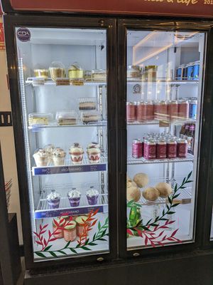 Deli case desserts and drinks at Planticeria in Panama City