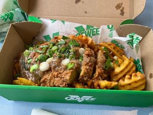 Cluckin' Waffle Fries at Oowee Vegan in North London