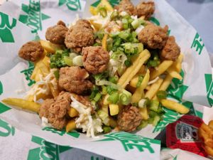 Cluckin' fries at Oowee Vegan in North London