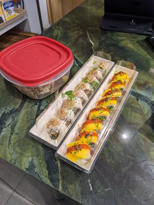 Spicy mango, kimchi and other rolls in my own container. at WholeLifeGo in Calgary
