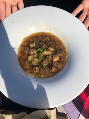 Onion soup with dark beer. Ask them to omit cheese to make it vegan. at Stelleplas in Heinkenszand