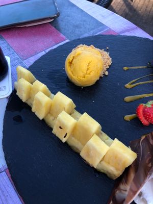 Pineapple with mango-passion fruit sorbet. at Stelleplas in Heinkenszand