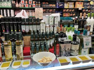 Olive oil vendor at Mercado Central de Valencia in Valencia