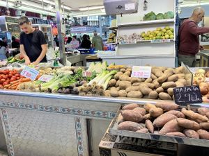 Produce vendor  at Mercado Central de Valencia in Valencia