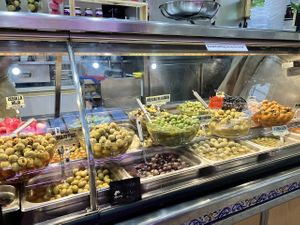 Olive vendor at Mercado Central de Valencia in Valencia