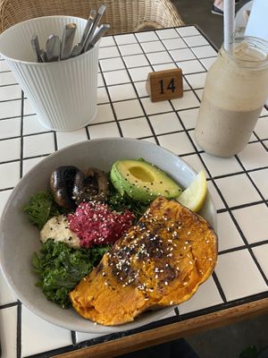 Nourish bowl with roasted pumpkin, mushrooms, greens, avocado and hummus. Yummy   at Papaya in Lennox Head