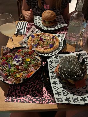 Trueffle Pizza, shawarma loaded fries, rib burger and dontremembertheothername at Vegan Junk Food Bar - El Born in Barcelona