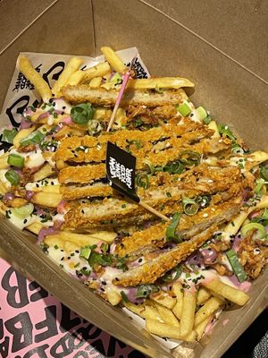 Iconic rainbow fries at Vegan Junk Food Bar - El Born in Barcelona
