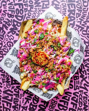 Iconic Rainbow Fries at Vegan Junk Food Bar - El Born in Barcelona