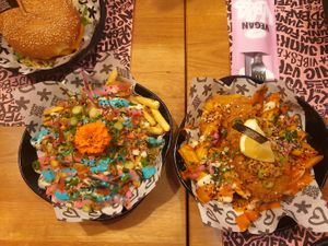 Rainbow fries and fish and chips at Vegan Junk Food Bar - El Born in Barcelona