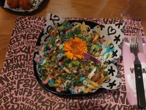 Rainbow loaded fries at Vegan Junk Food Bar - El Born in Barcelona