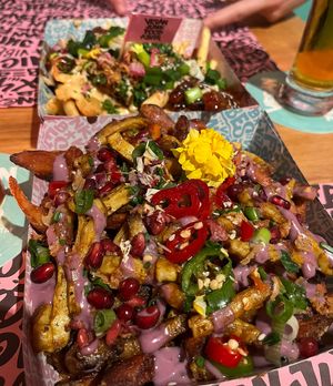 Loaded freak fries with sweet potatoes and shawarma-style vegan meat  at Vegan Junk Food Bar - El Born in Barcelona