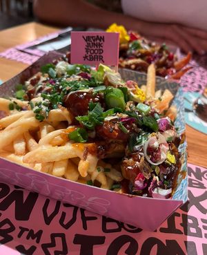 Loaded fries with regular fries and vegan rib-styled meat  at Vegan Junk Food Bar - El Born in Barcelona