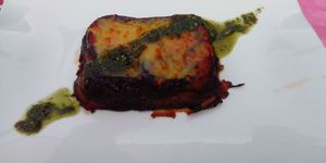 Vegan eggplant mozzarella with pesto. at Giardino in Bellinzona