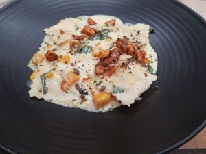 Pumpkin Ravioli with Vegan cheese spinach and chilli Walnuts at Mother in Fremantle