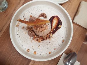 Vanilla, coffee, hazelnut and chocolate panna cottage with wattle seed tulle (GF and processed sugar free) at Mother in Fremantle