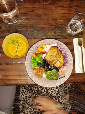 Vegan poke bowl with lots of veggies, fruits and tempeh at Gostilna Vida in Ljubljana