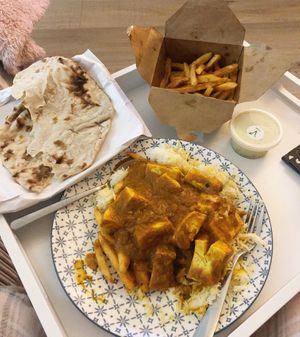 Tofu makahni, tikka fries, pilau rice and roti at Vegan Rasoi in Barry