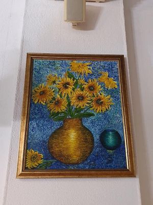 Decor on the Wal reflecting the name  at Sunflower Vegetarian Cafe in Mount Lawley