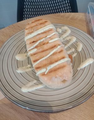 El Choripan Vegano - 
Grilled Bocatta bread with chorizo, tomato, house sauce and pickled onion  at Debby's Good Veggie Food in Barcelona