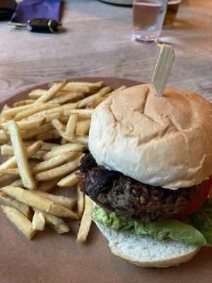 The mushroom lentil burger with tomato, red onion marmalade, and fries. Even the tomato was delicious !  at The Punter in Oxford