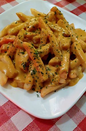 Improved cheese fries, actually a cheesy cashew poutine, impressive! at The Peanut Bar Restaurant in Reading