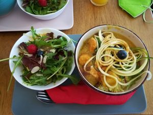 Menu, peanut curry with salad at Golden Temple Teehaus in Hamburg