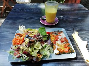 Wonderful vegan quiche with a big salad, and curcuma - vanilla latte at Golden Temple Teehaus in Hamburg