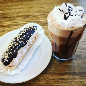 Raspberry eclair and peanut butter hot chocolate at Vx in North London